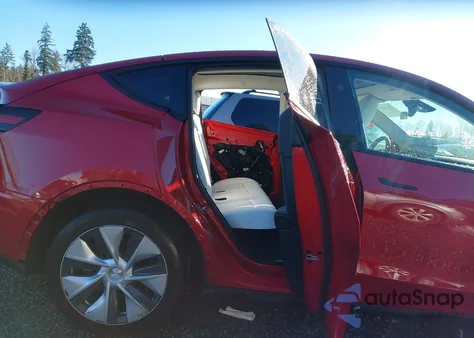 2023 Tesla Model Y Awd/Long Range Dual Motor All-Wheel Drive z USA, uszkodzony, nr VIN 7SAYGDEE1PF838577